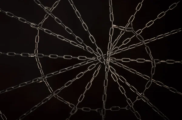 Steel chain in the form of a web — Stock Photo, Image