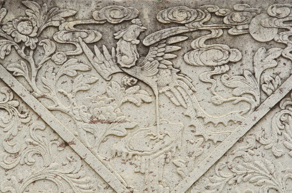 Камень, высеченный в храме изумрудного Будды
