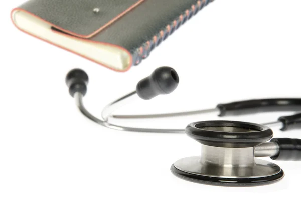 Stethoskop mit Notizbuch — Stockfoto