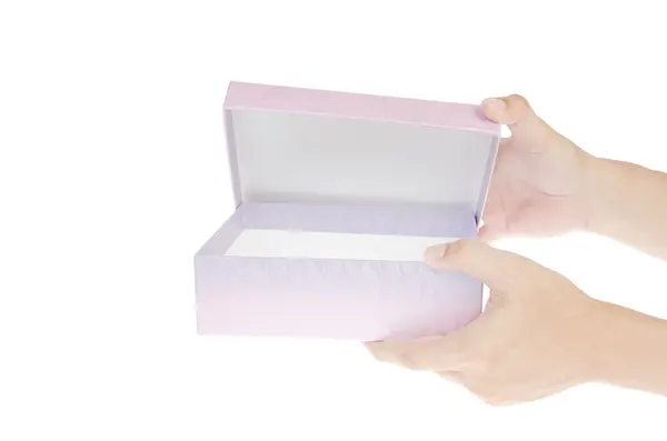 Hand hält rosa Geschenkbox — Stockfoto