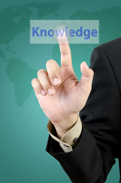 Hombre de negocios mano tocar botón de conocimiento —  Fotos de Stock