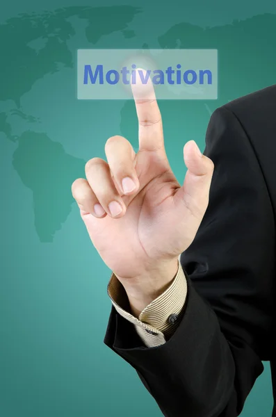 Businessman hand touching motivation button — Stock Photo, Image