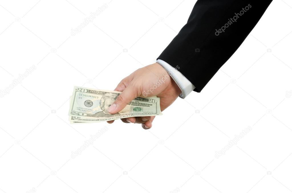 Hand holding US dollars isolated on white background