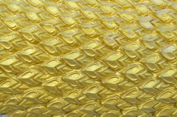 Текстурная скульптура чешуи Золотого Дракона — стоковое фото