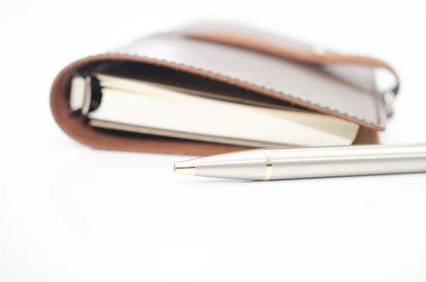 Bolígrafo y cuaderno — Foto de Stock