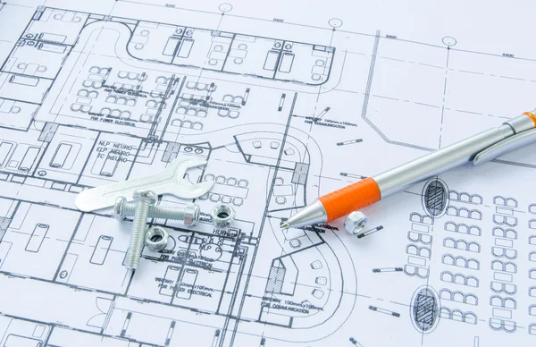 Moeren en bouten over architectonische plan — Stockfoto