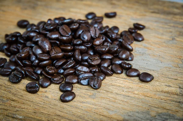 Coffee on grunge wooden background — Stock Photo, Image