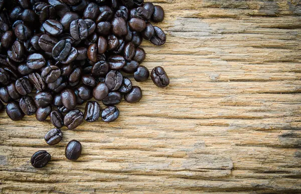 Coffee on grunge wooden background — Stock Photo, Image