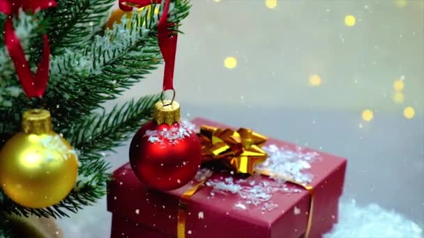 Christmas decor and falling snow. Selective focus. — Stock Video