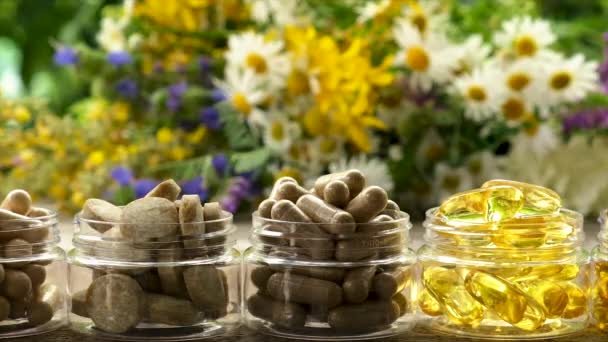 Medicinal herbal extracts and dietary supplements. Selective focus. — Stock Video