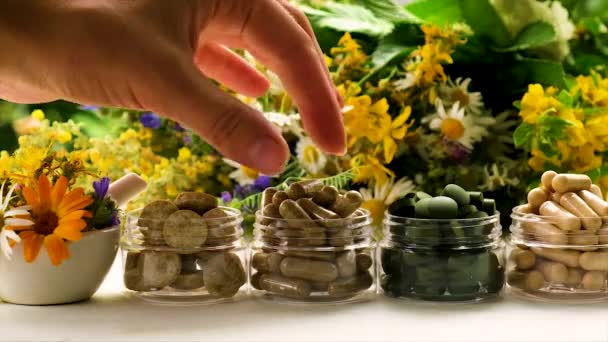 Medicinal herbal extracts and dietary supplements. Selective focus. — Stock Video