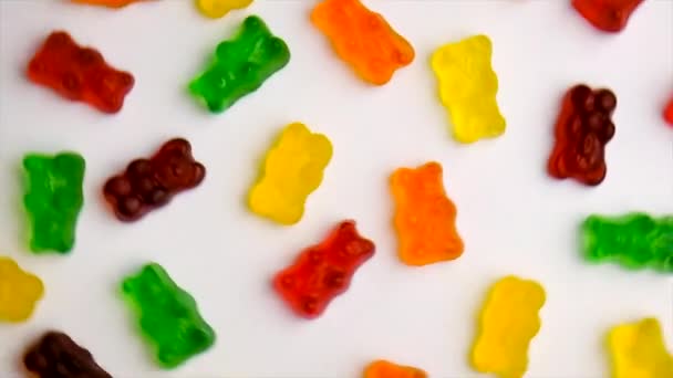 The child eats vitamins jelly candy. Selective focus. — Stockvideo