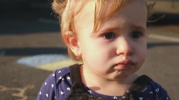 Baby has snot on her face. Selective focus. — Video Stock