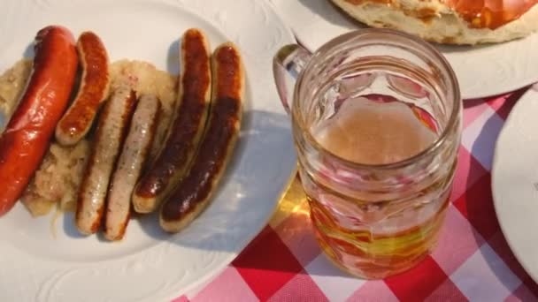 Bavarian beer in a brasserie and food. Selective focus. — стокове відео