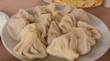 Khinkali on the table Georgian cuisine. Selective focus.