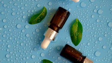 Hyaluronic acid on a background with water drops. Selective focus. Spa.
