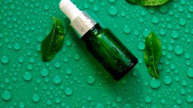 Hyaluronic acid on a background with water drops. Selective focus. Spa.