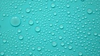 Water drops moisturizing cosmetic background. Hyaluronic acid. Selective focus. spa.