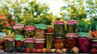 Jars with preserved vegetables for the winter. Selective focus. Food.