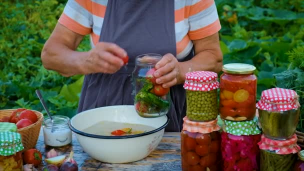 Senior Woman Makes Preservation Vegetables Selective Focus People — Wideo stockowe
