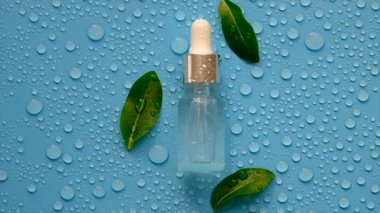 Hyaluronic acid on a background with water drops. Selective focus. Spa.