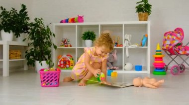 The child sits on the potty. Selective focus. Kid.