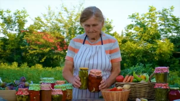 Senior Woman Makes Preservation Vegetables Selective Focus People — Stok Video