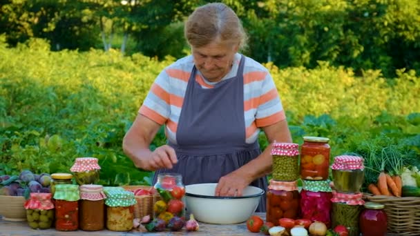 Senior Woman Makes Preservation Vegetables Selective Focus People — Vídeo de Stock