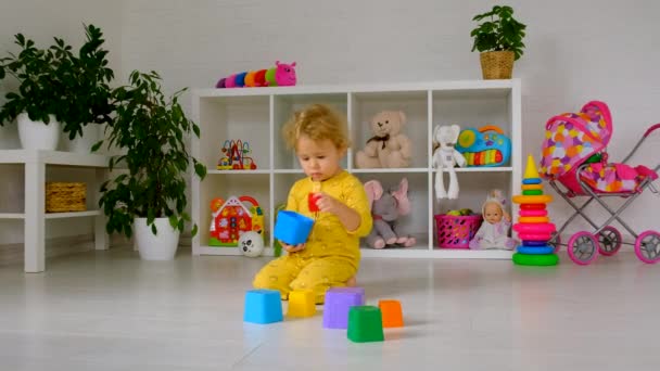 Child Plays Toys Room Selective Focus Kid — Stock Video