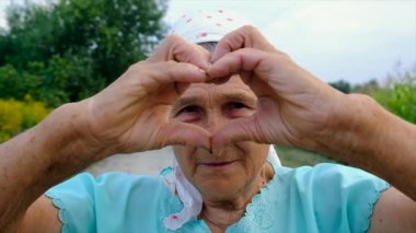 Beautiful portrait of an old woman. Selective focus. People.