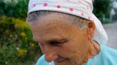 Beautiful portrait of an old woman. Selective focus. People.