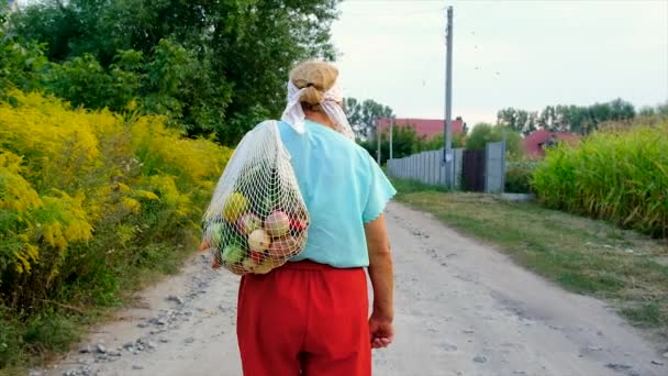 Grandmother Carries Vegetables Shopping Bag Selective Focus Food — Stockvideo