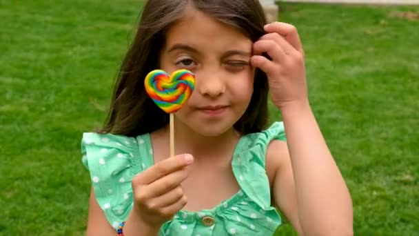 Child Eats Lollipop Candy Selective Focus Kid — Stock Video
