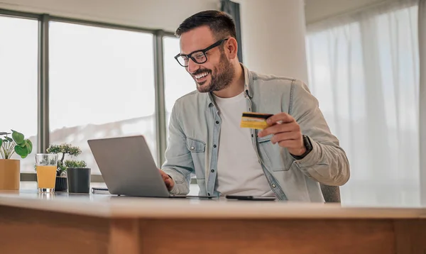 Curious Adult Man Looking His Bank Balance Online Using His — Stockfoto