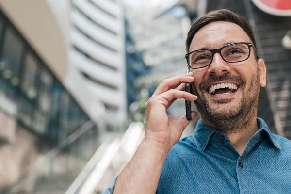 Portrait Happy Laughing Businessman Wearing Glasses Having Telephone Call While — Φωτογραφία Αρχείου