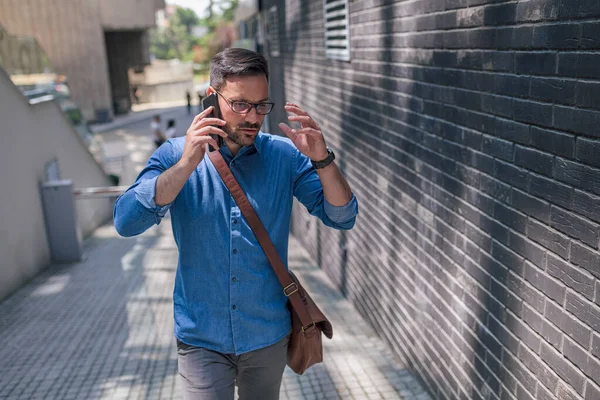 Serious Entrepreneur Talking Smart Phone Young Male Professional Formals Carrying — Foto Stock