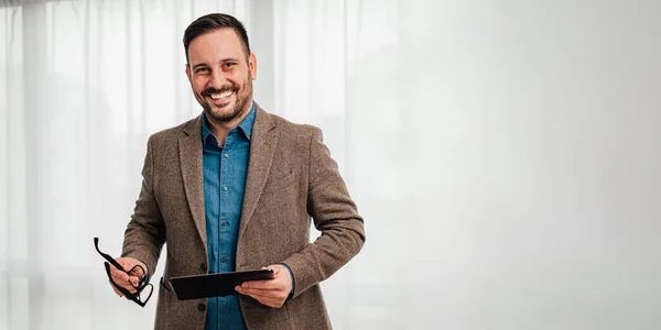 Portrait Cheerful Young Entrepreneur Holding Digital Tablet Smiling Male Professional — Foto Stock