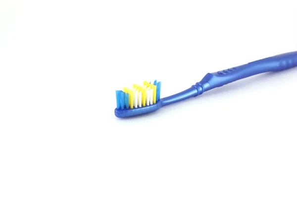 Tooth-brush with blue handle — Stock Photo, Image