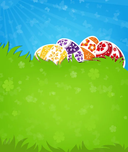 Oeufs de Pâques dans l'herbe — Image vectorielle