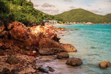 Red cave at Thong lang beach at Larn island (Koh Larn). Beautiful of sea at Chonburi, Thailand.