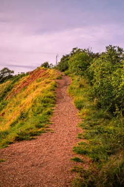 Sunset at Giant cliff at Larn island (Koh Larn). Beautiful of sea at Chonburi, Thailand.