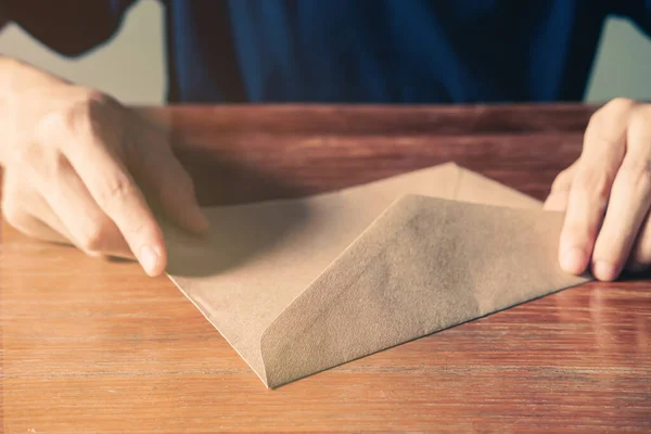 Close Beautiful Man Hands Opening Envelope Brown Wooden Tabel Background — Stock Photo, Image