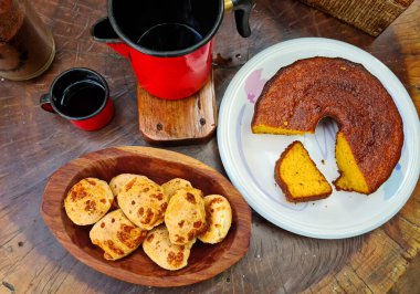 breakfast; cheese bread; corn cake; coffee