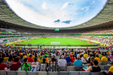 Futbol veya futbol stadyumunun odaksız arka planı