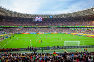 Futbol veya futbol stadyumunun odaksız arka planı