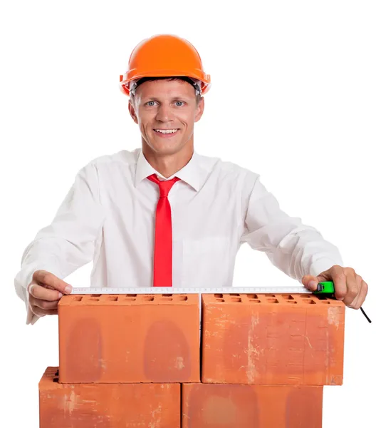 Businessman with bricks — Stock Photo, Image