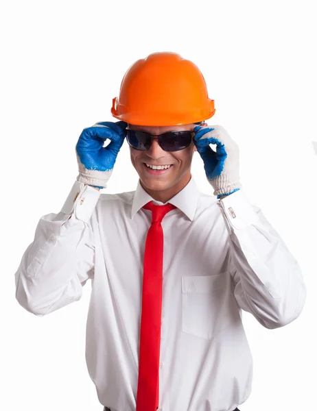 En byggnadsarbetare med solglasögon på — Stockfoto