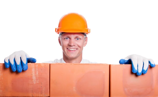 Businessman with bricks on white — Stock Photo, Image