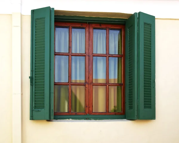 Green shutters window — Stock Photo, Image