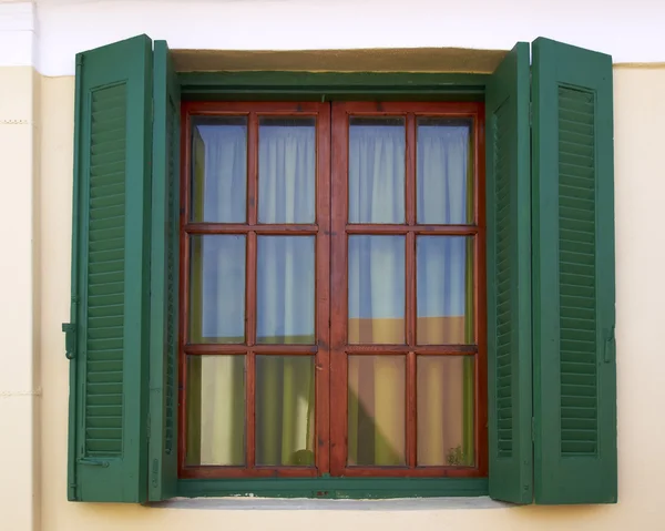 Green shutters window — Stock Photo, Image